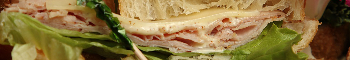Eating Sandwich Cheesesteak at Explorers Den restaurant in Philadelphia, PA.
